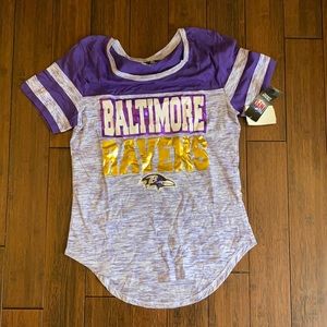 Women’s Baltimore Ravens team shirt.